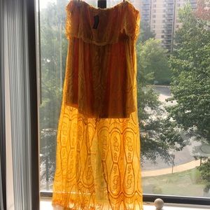 Stunning yellow strapless dress with high low hem